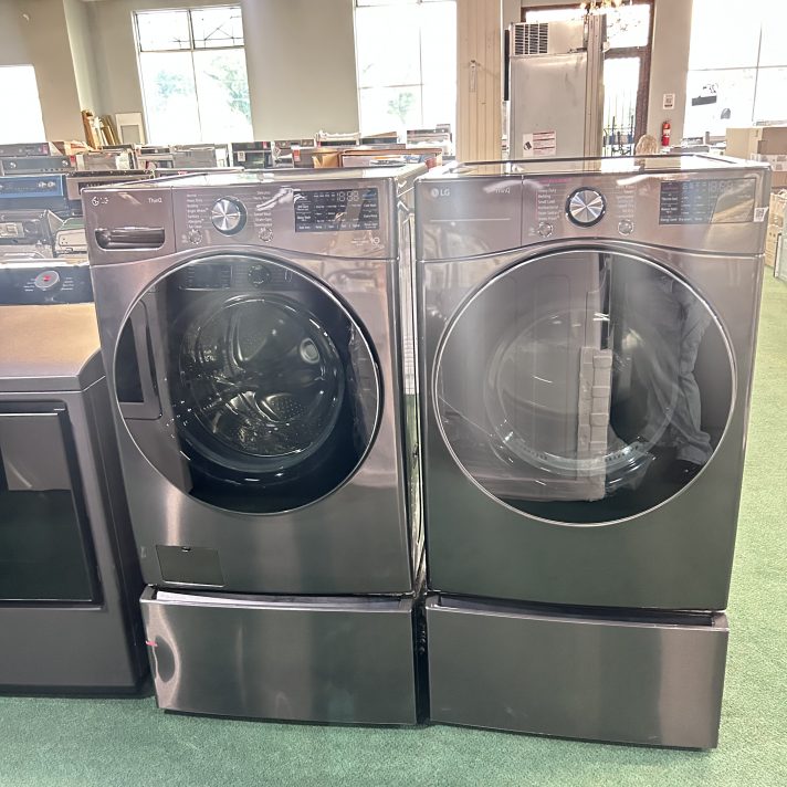 LG 27 Inch Wide 5 Cu. Ft. Front Load Washer and 7.4 Cu. Ft. Front Load Electric Dryer Laundry Pair with TurboSteam + 2 Pedestals
