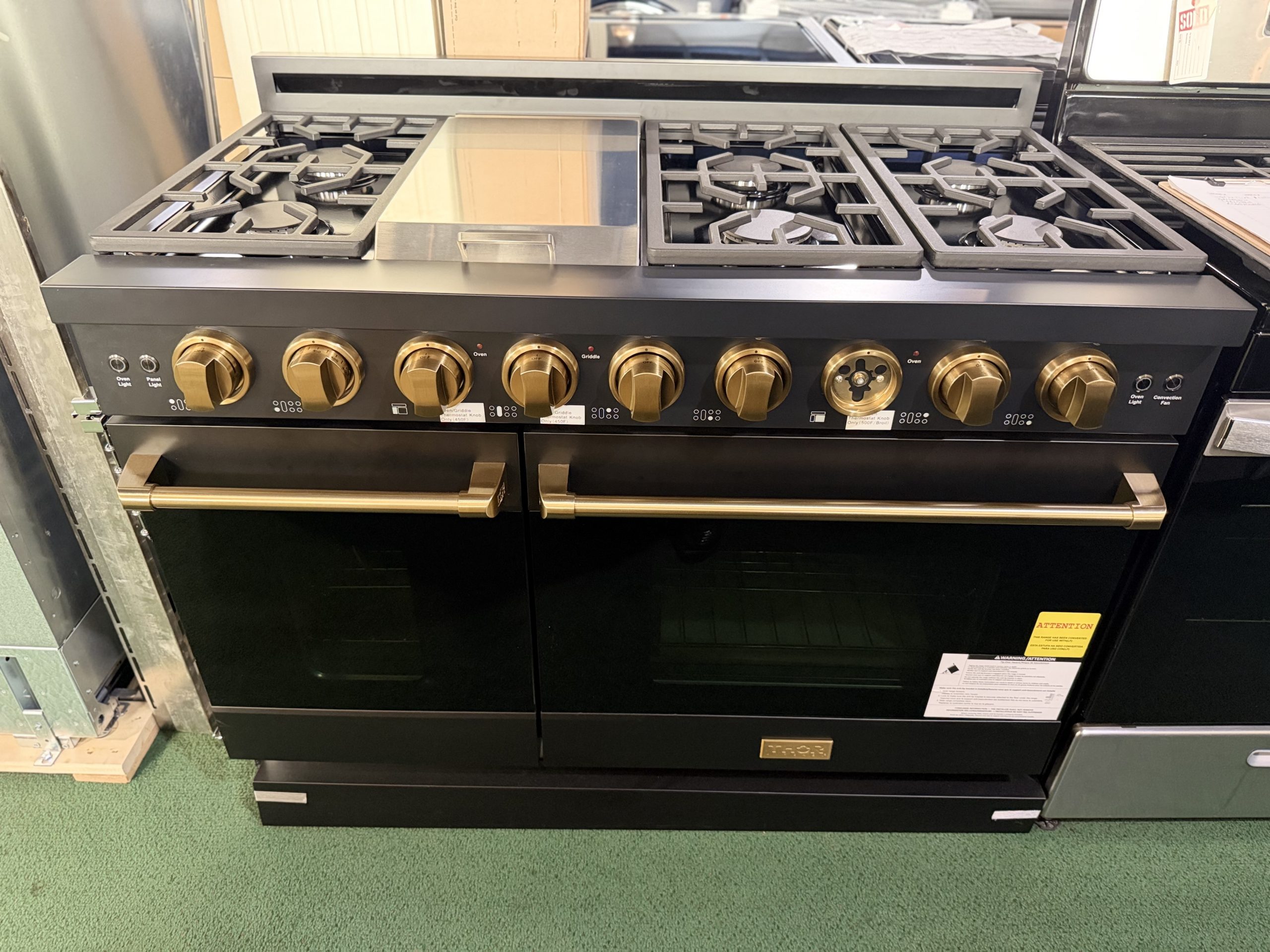 Thor* Kitchen Gordon Ramsay Collection 48'' 6.8 Cu. Ft Freestanding Liquid Propane Gas Range with Bronze Hardware - Black