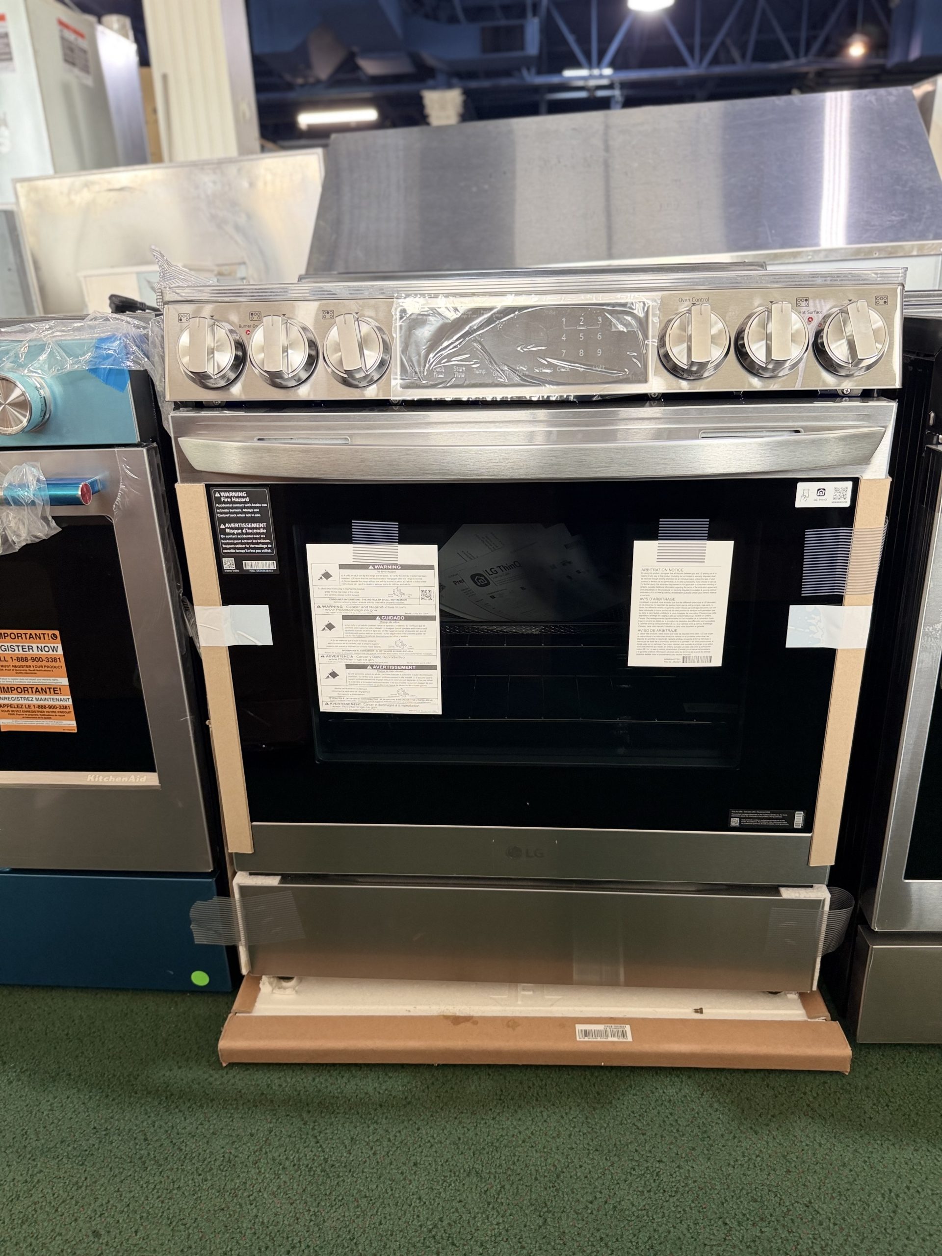 LG* 30-in Glass Top 5 burners 6.3-cu ft Air Fry Convection Oven Slide-In Electric Range ( PrintProof Stainless Steel )