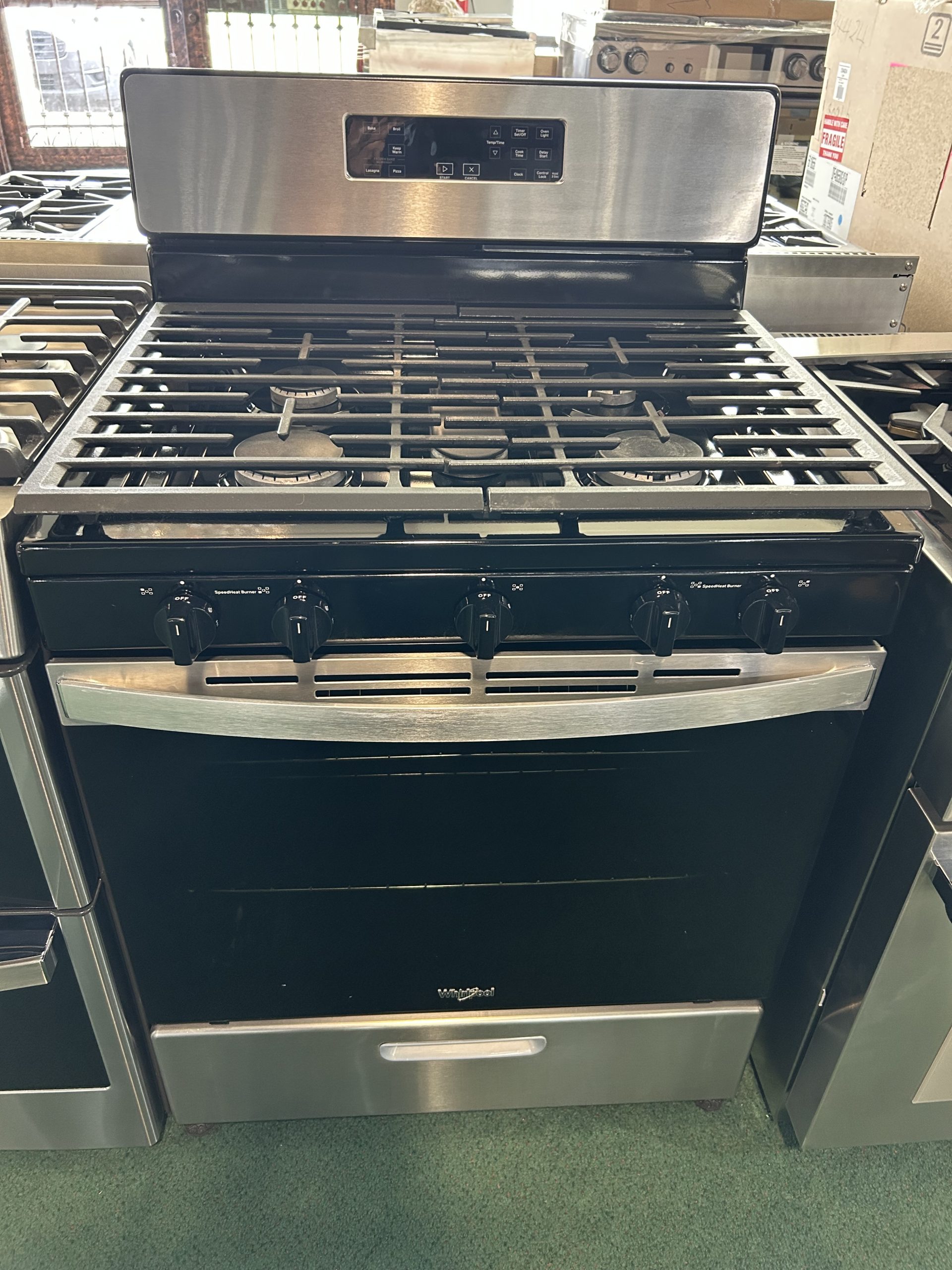 Whirlpool 30 Inch Freestanding Gas Range with Edge to Edge Cooktop - Stainless Steel